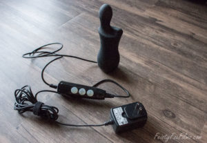 The Doxy Don stands on a hardwood floor, its lengthy cord sprawling around it.